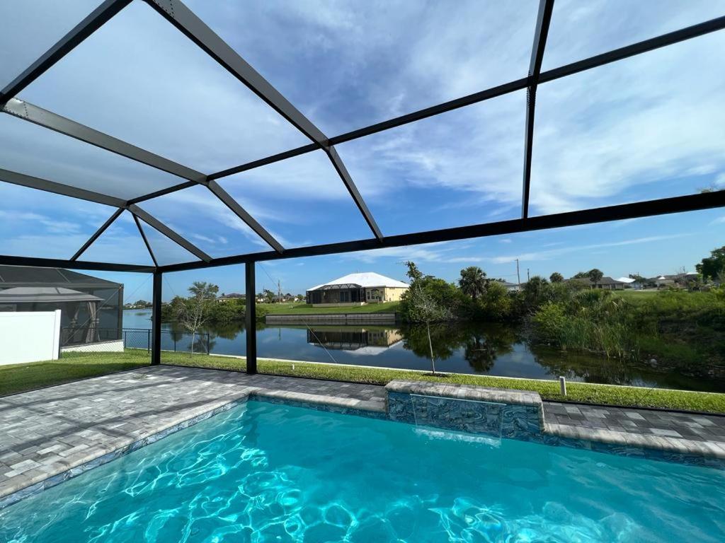 Newly built Villa Ballerina with heated pool and incredible view into beautiful Arrowheadcanal view 3