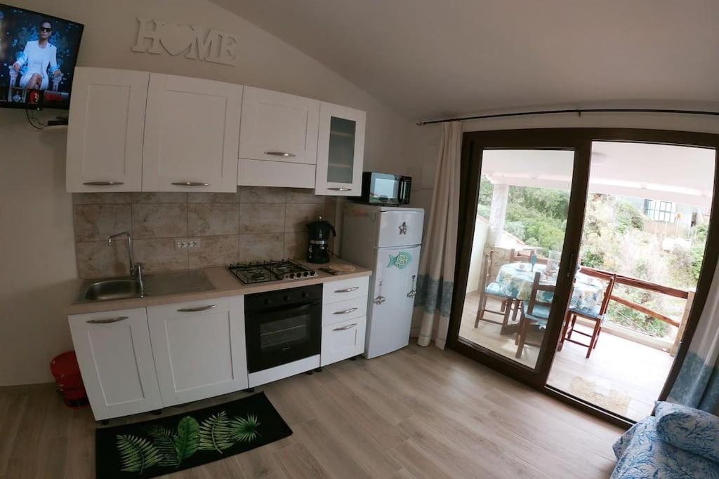 Oasi del Relax - Seaside Peaceful Panoramic Terrace in ITALY - new Sardinia apartment 50 mt beach&sea full comfort air conditioning-WiFi-Parking-Privacy