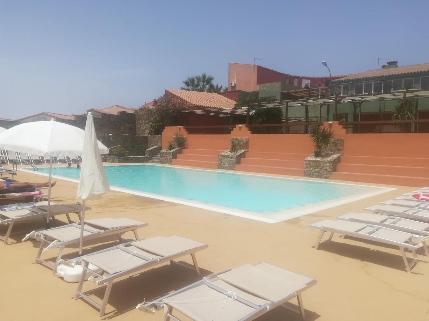 Oasi del Relax - Seaside Peaceful Panoramic Terrace in ITALY - new Sardinia apartment 50 mt beach&sea full comfort air conditioning-WiFi-Parking-Privacy
