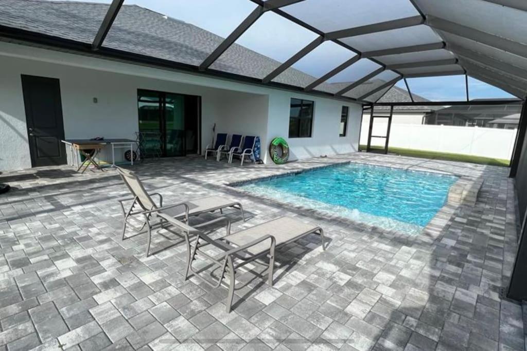 Newly built Villa Ballerina with heated pool and incredible view into beautiful Arrowheadcanal view 5