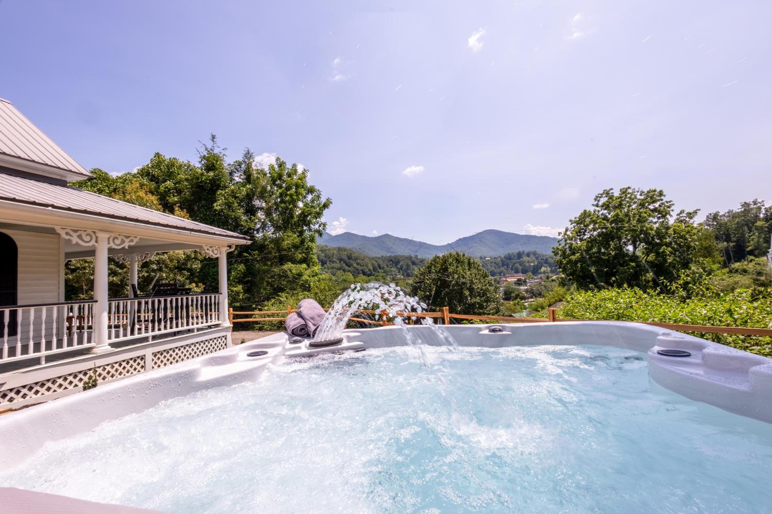 WALK TO TOWN! MTN VIEWS! HOT TUB! FIREPIT! SLEEPS 10 at Steps to Bryson view 2