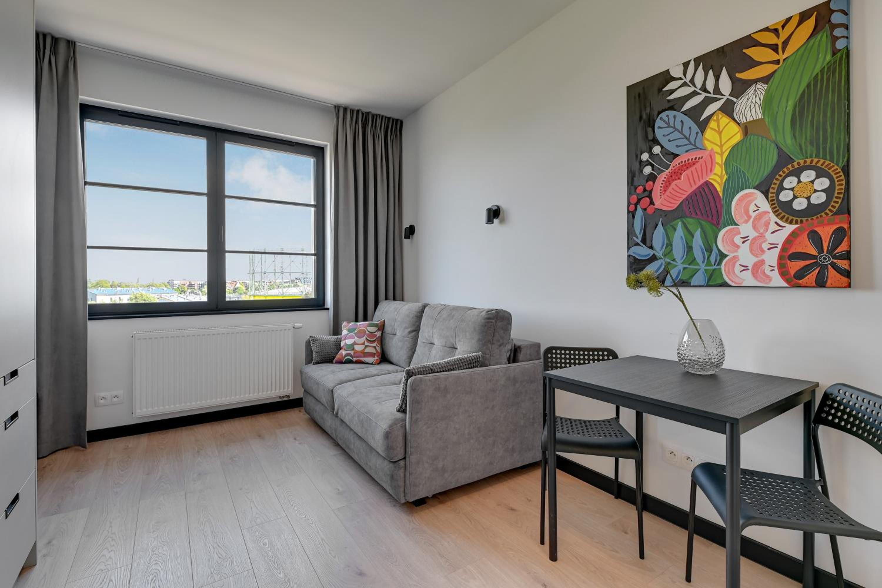 DOKI Living & Foodhall by Downtown Apartments