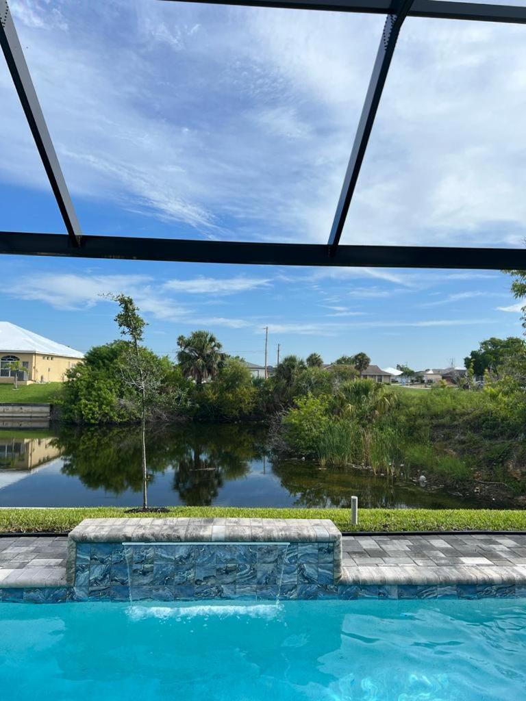 Newly built Villa Ballerina with heated pool and incredible view into beautiful Arrowheadcanal view 4
