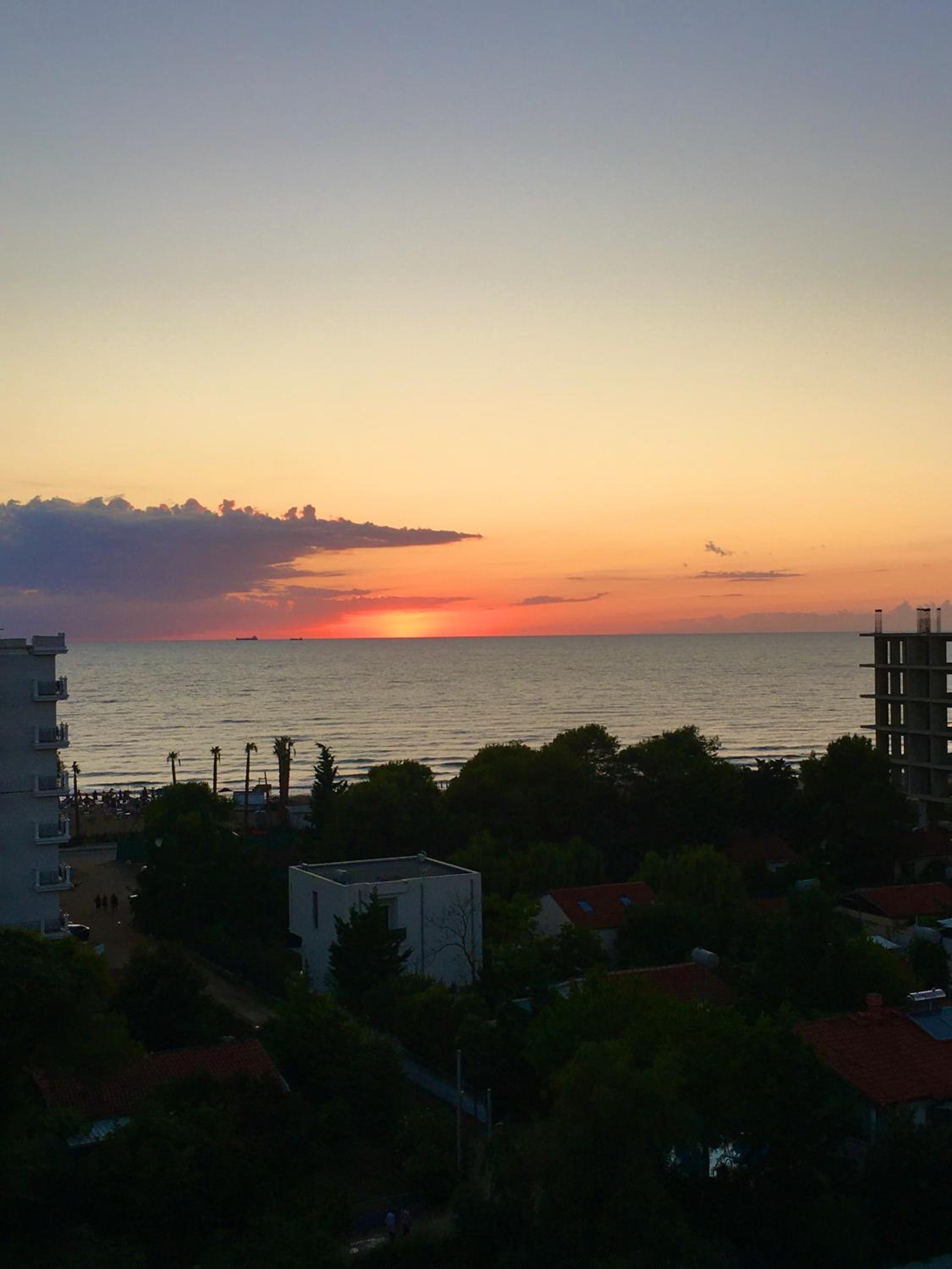 Blue Apartment Golem sunset