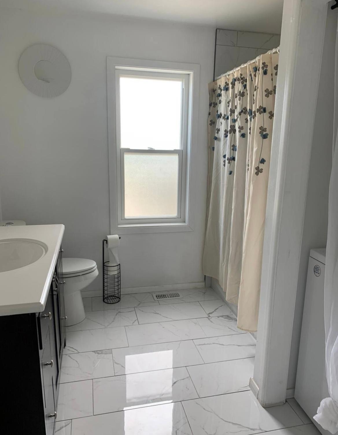 Self contained 2 level apartment with 4 bdrms & 2 bathroom