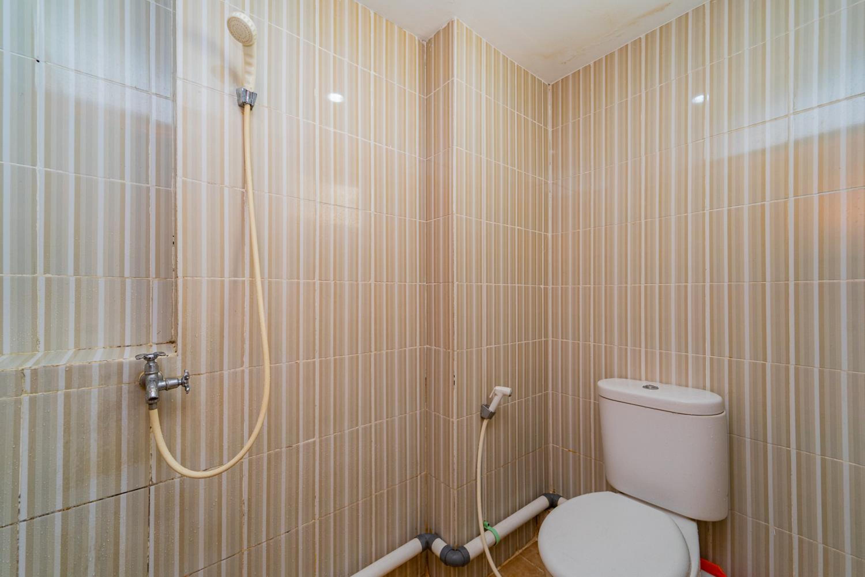 RedLiving Apartemen Cinere Resort - Gold Room
