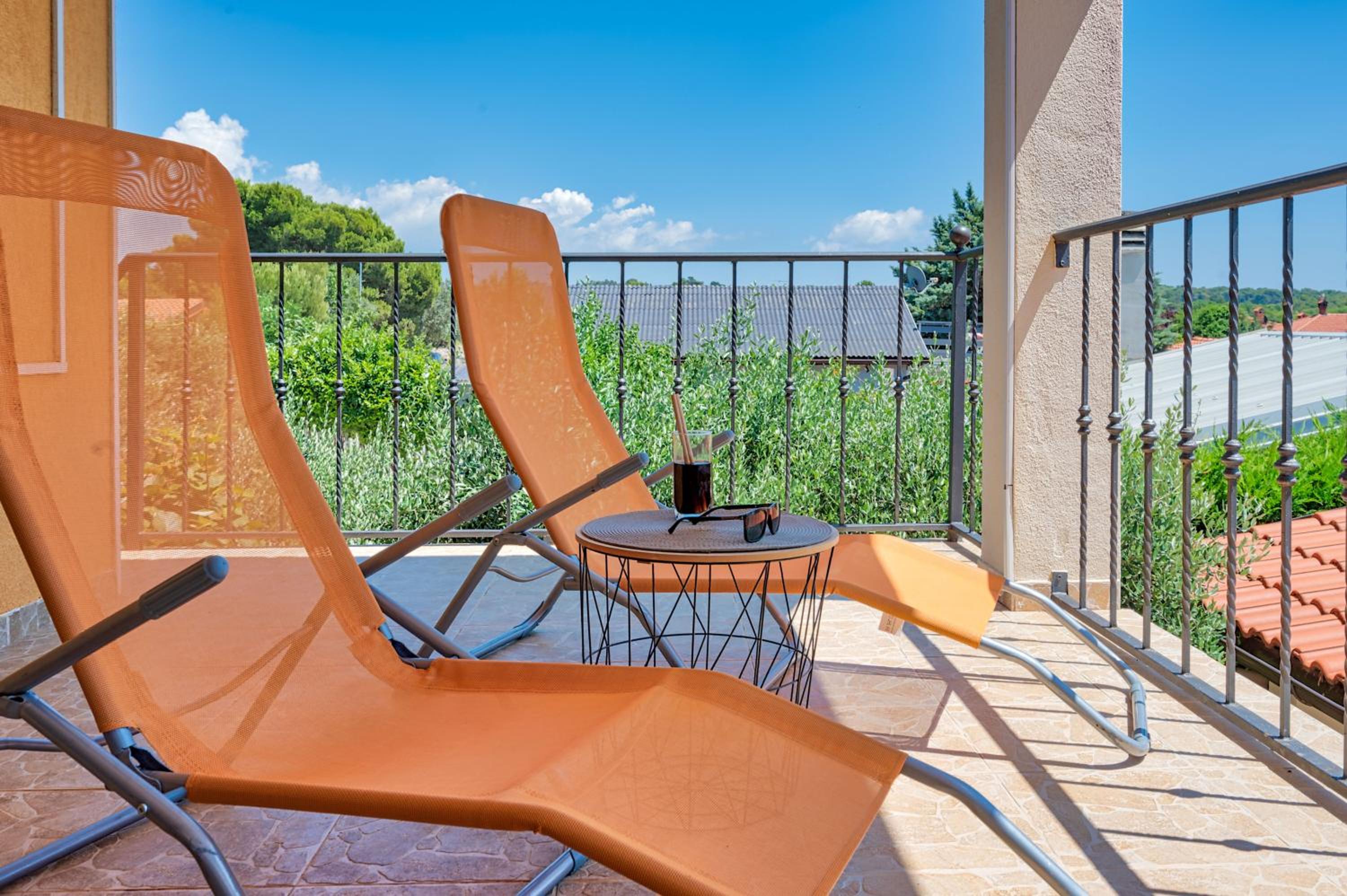 Teuta Apartments - a beach and a sea view