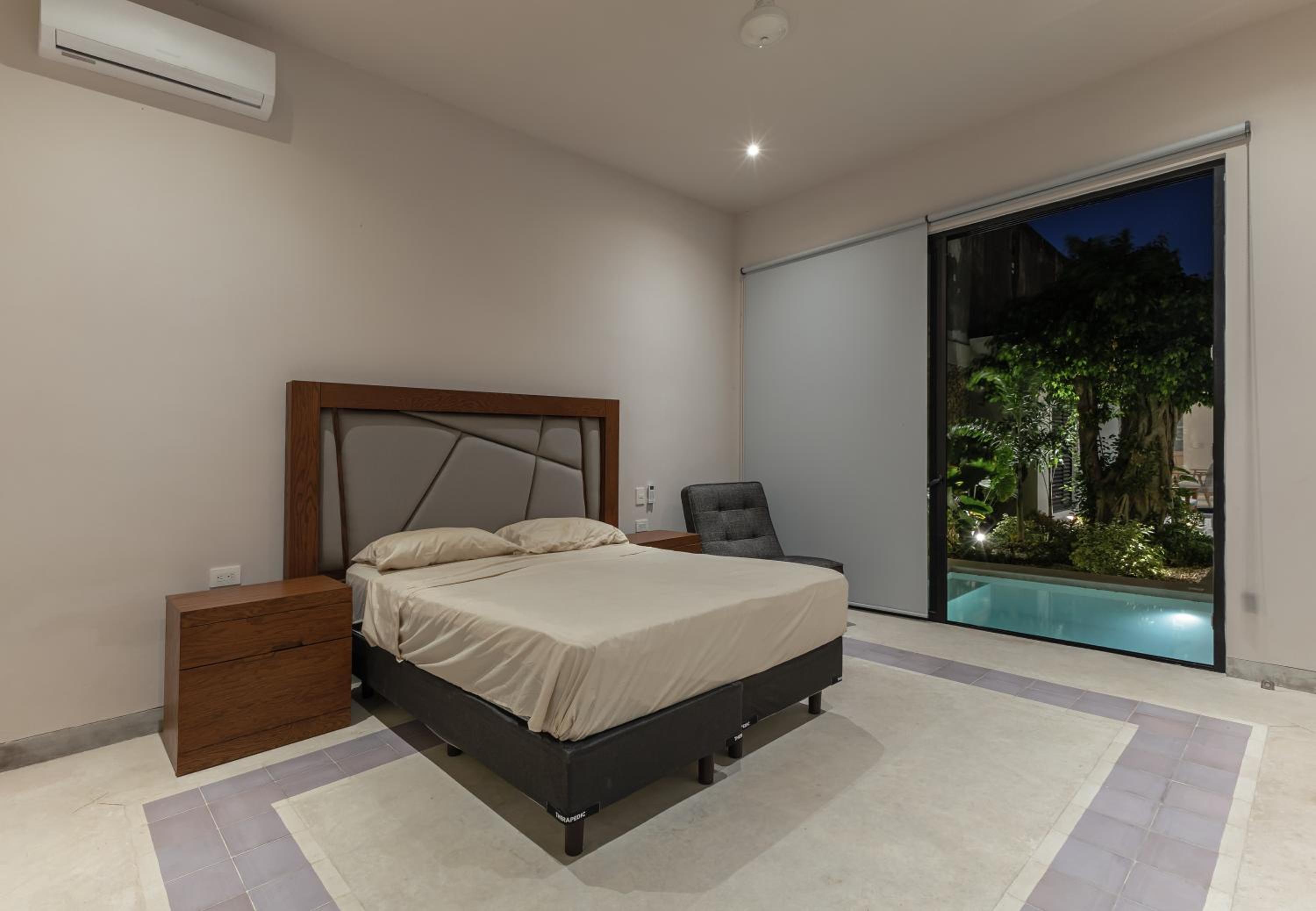2 Bedrooms w/tv room and studio w/pool and garage view 2