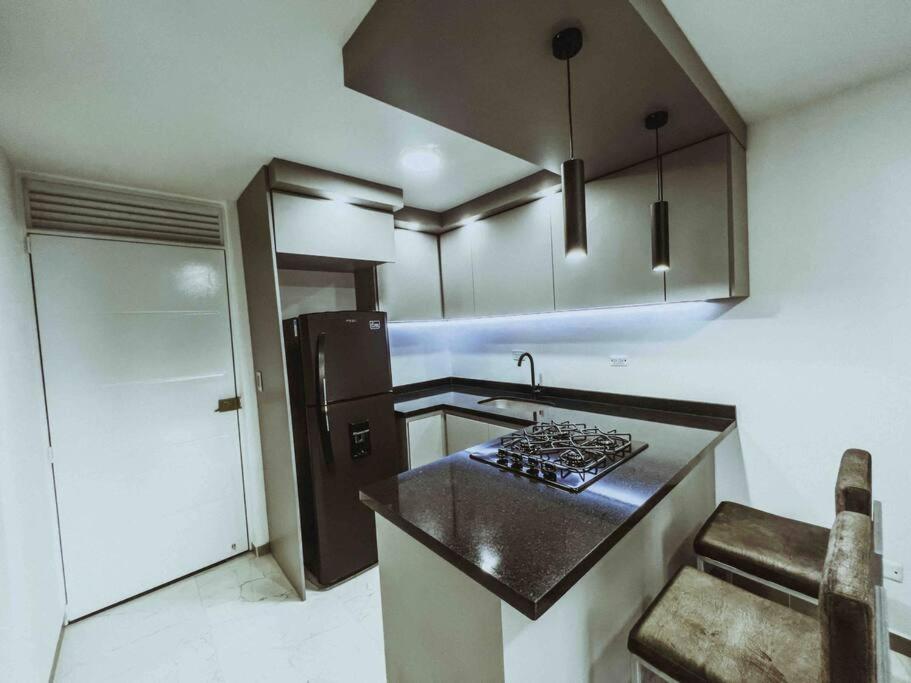 Moderno apto en club residencial