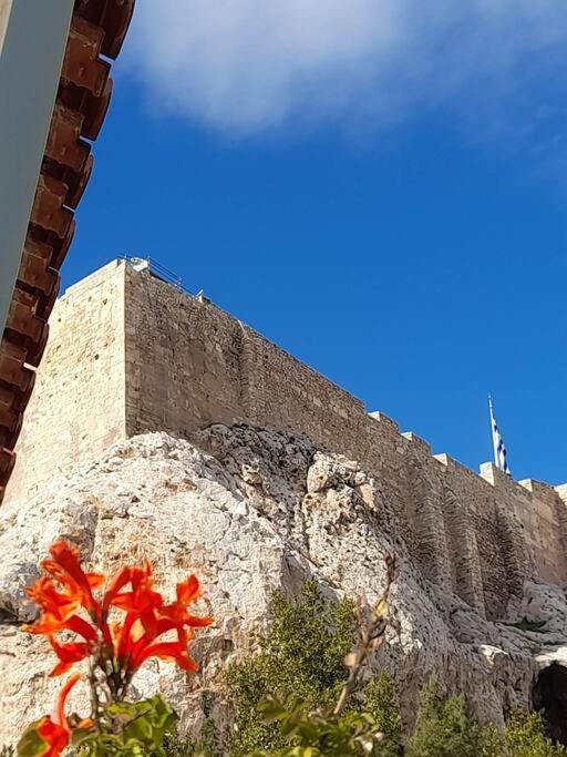 At the foot of Acropolis.