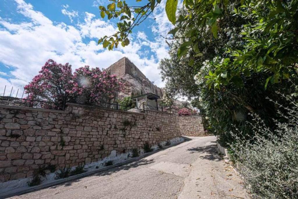 At the foot of Acropolis.