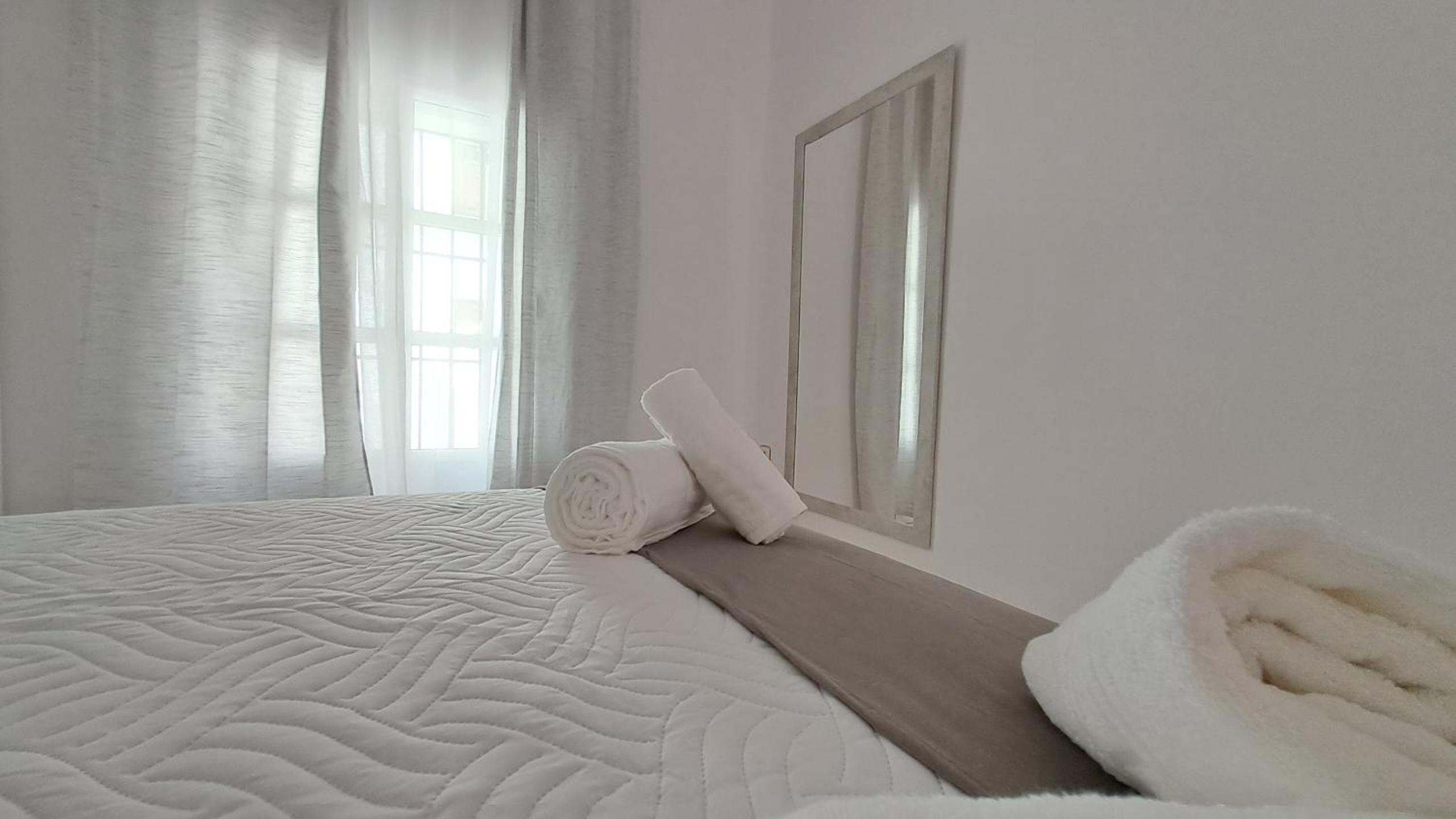 Apartamentos TrianaSol
