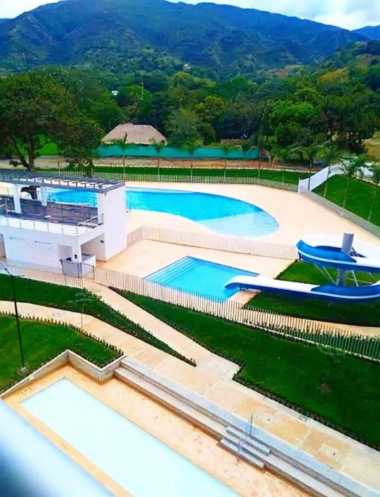 occidente colonial santa fe de Antioquia tipo resort Aparta sol tobogán kanaloa parque acuático