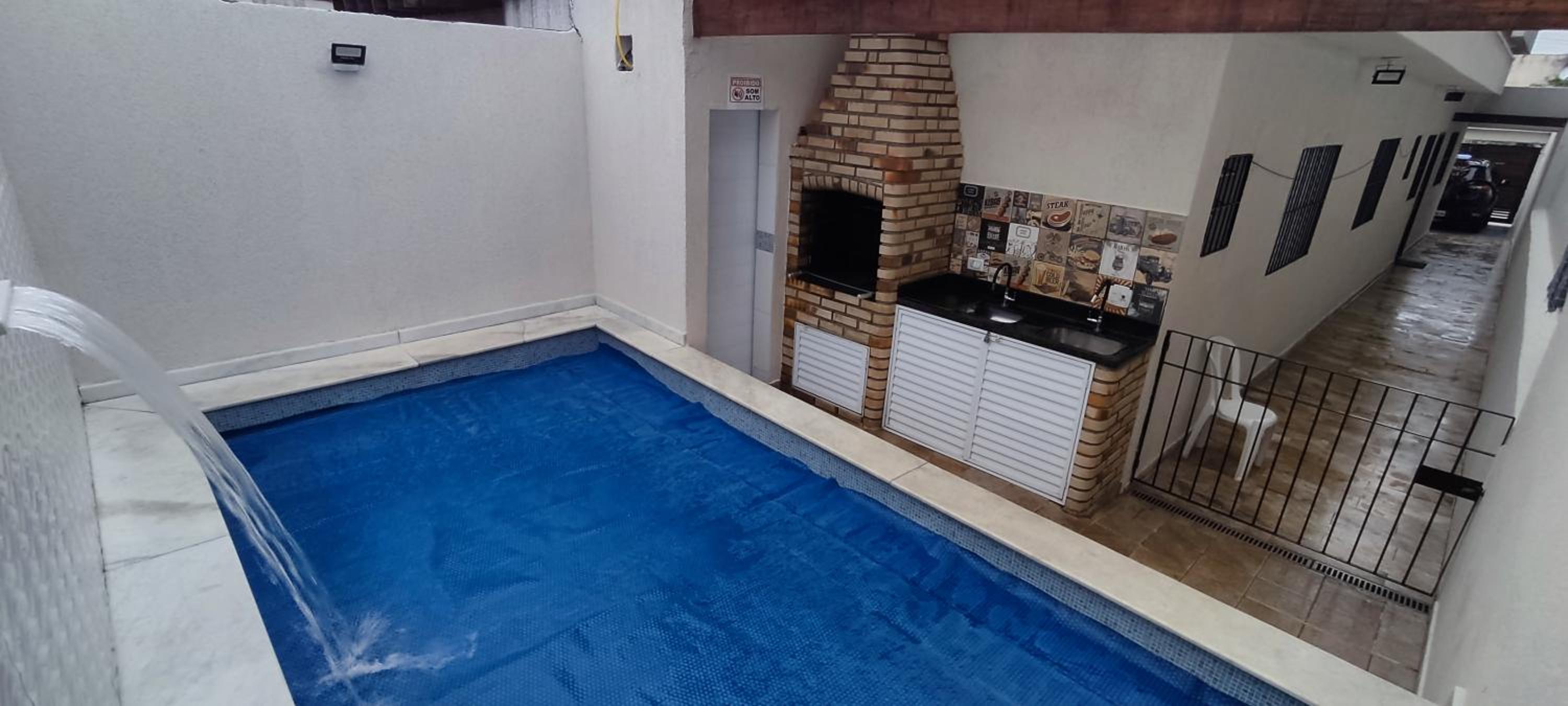 A Casa Linda Com Piscina Aquecida churrasqueira wifi pertinho da praia em Itanhaém