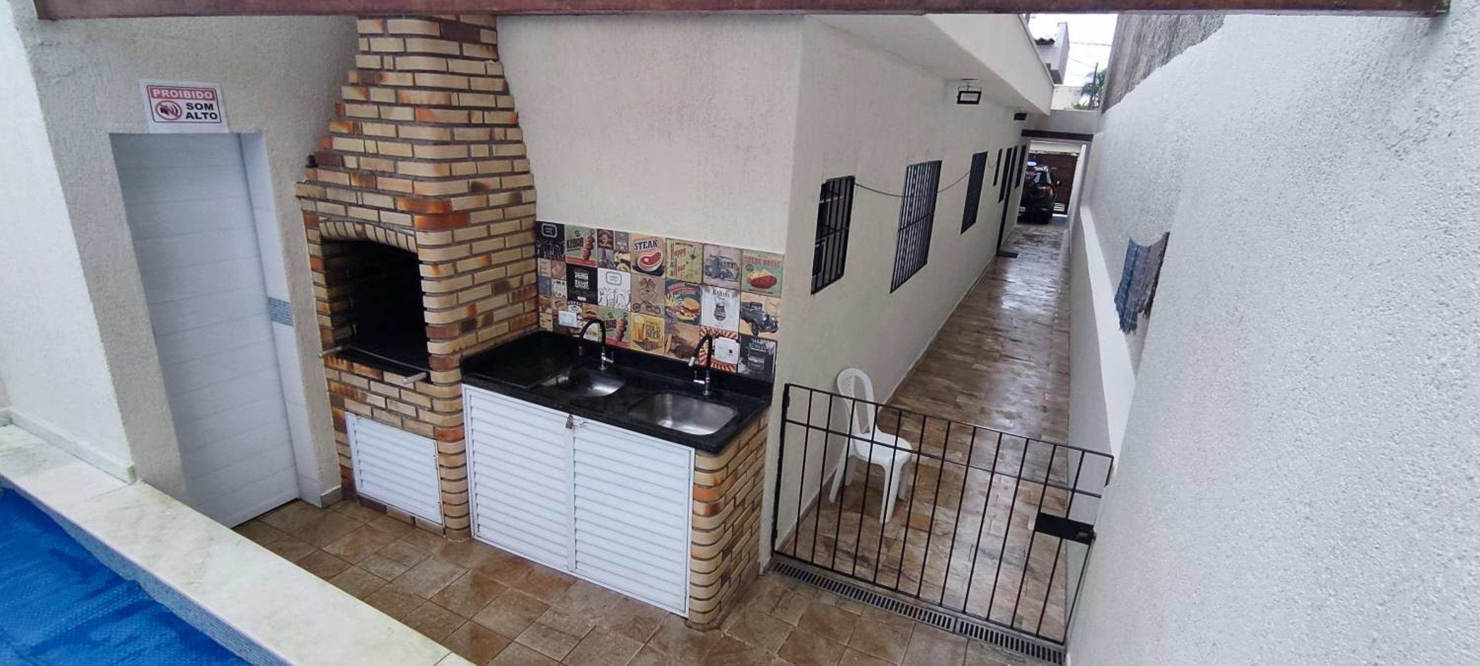 A Casa Linda Com Piscina Aquecida churrasqueira wifi pertinho da praia em Itanhaém