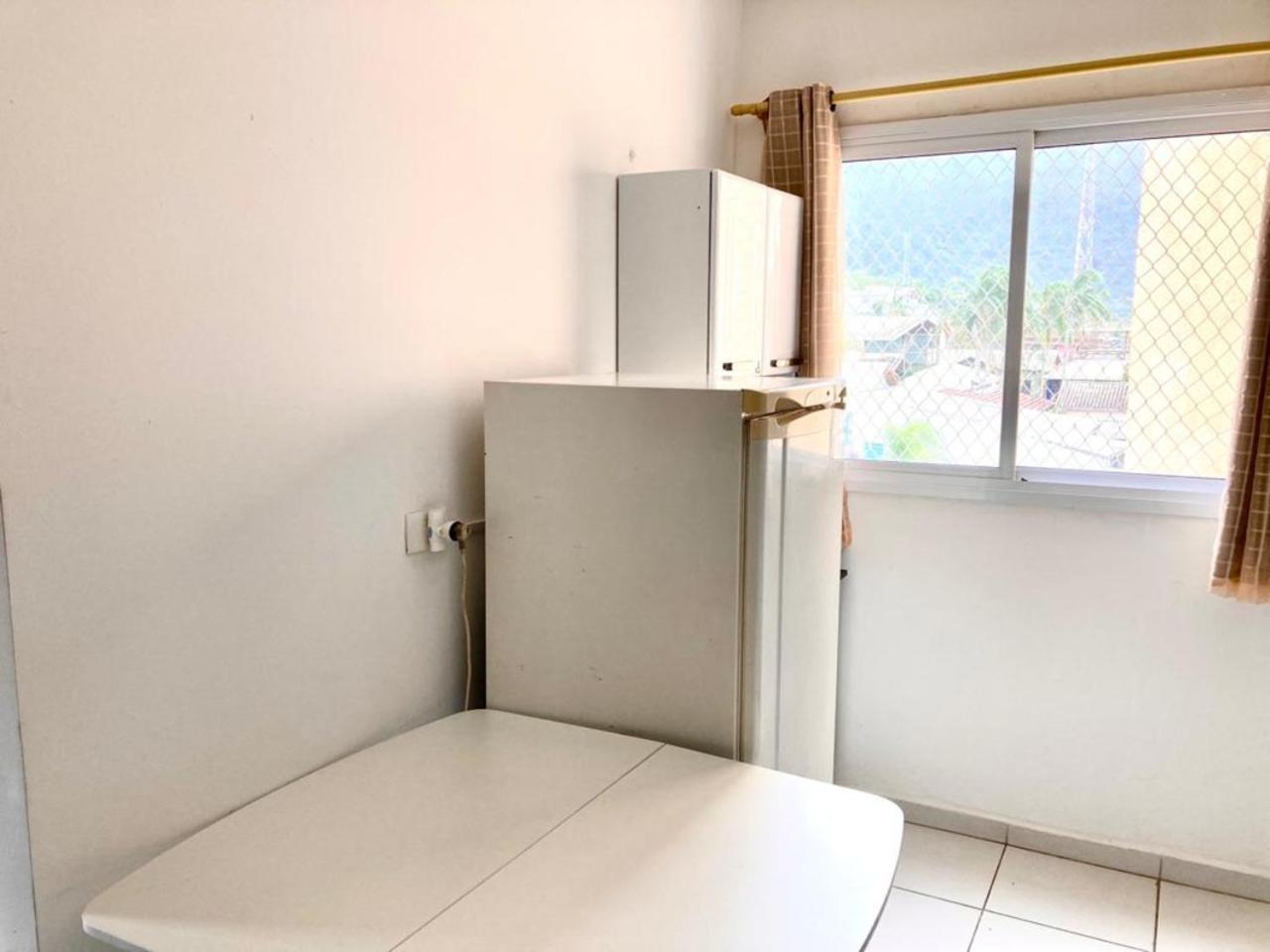 Apartamento studio em prédio de frente ao mar Massaguaçu Caraguatatuba
