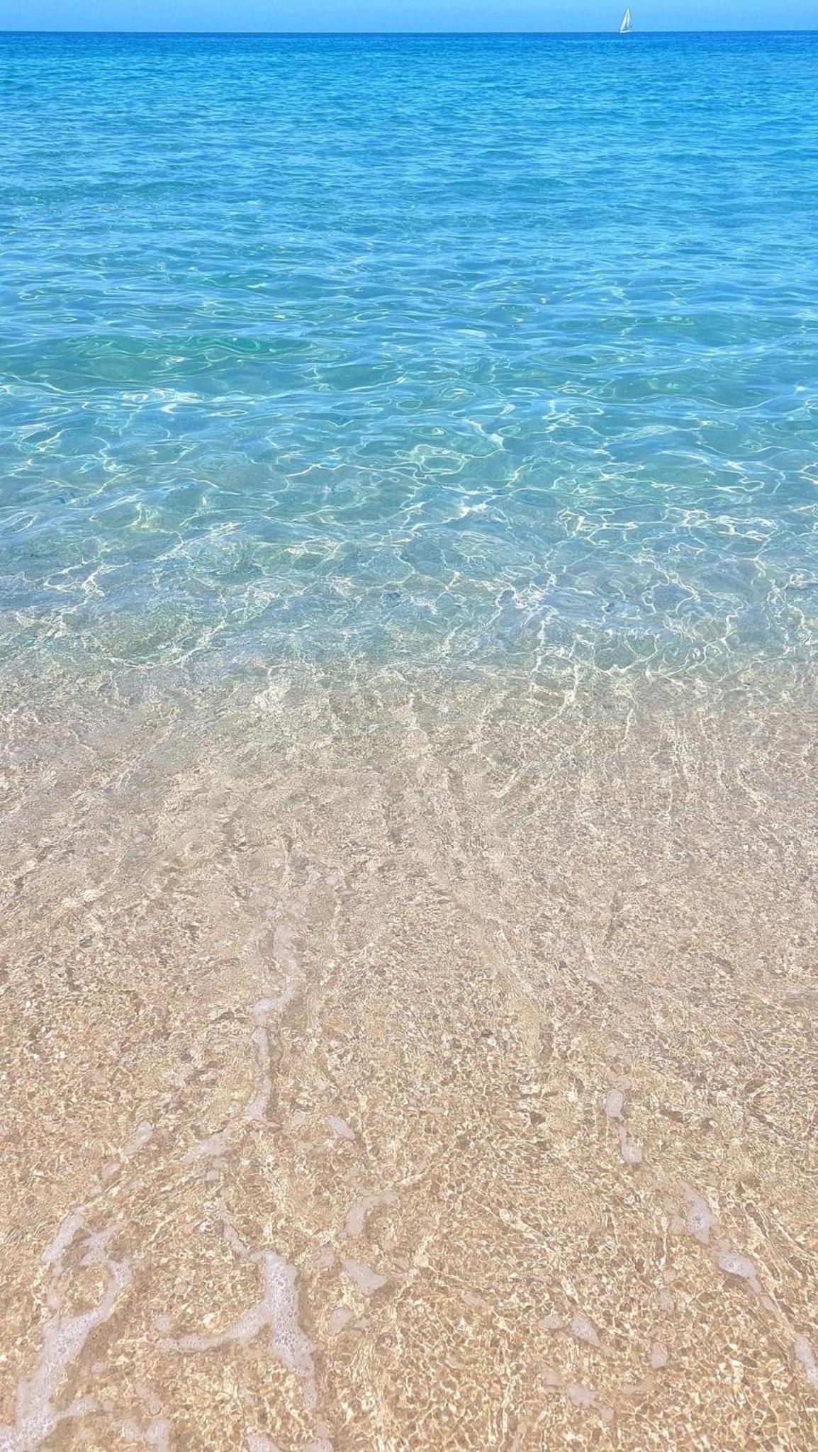 Oasi del Relax - Seaside Peaceful Panoramic Terrace in ITALY - new Sardinia apartment 50 mt beach&sea full comfort air conditioning-WiFi-Parking-Privacy