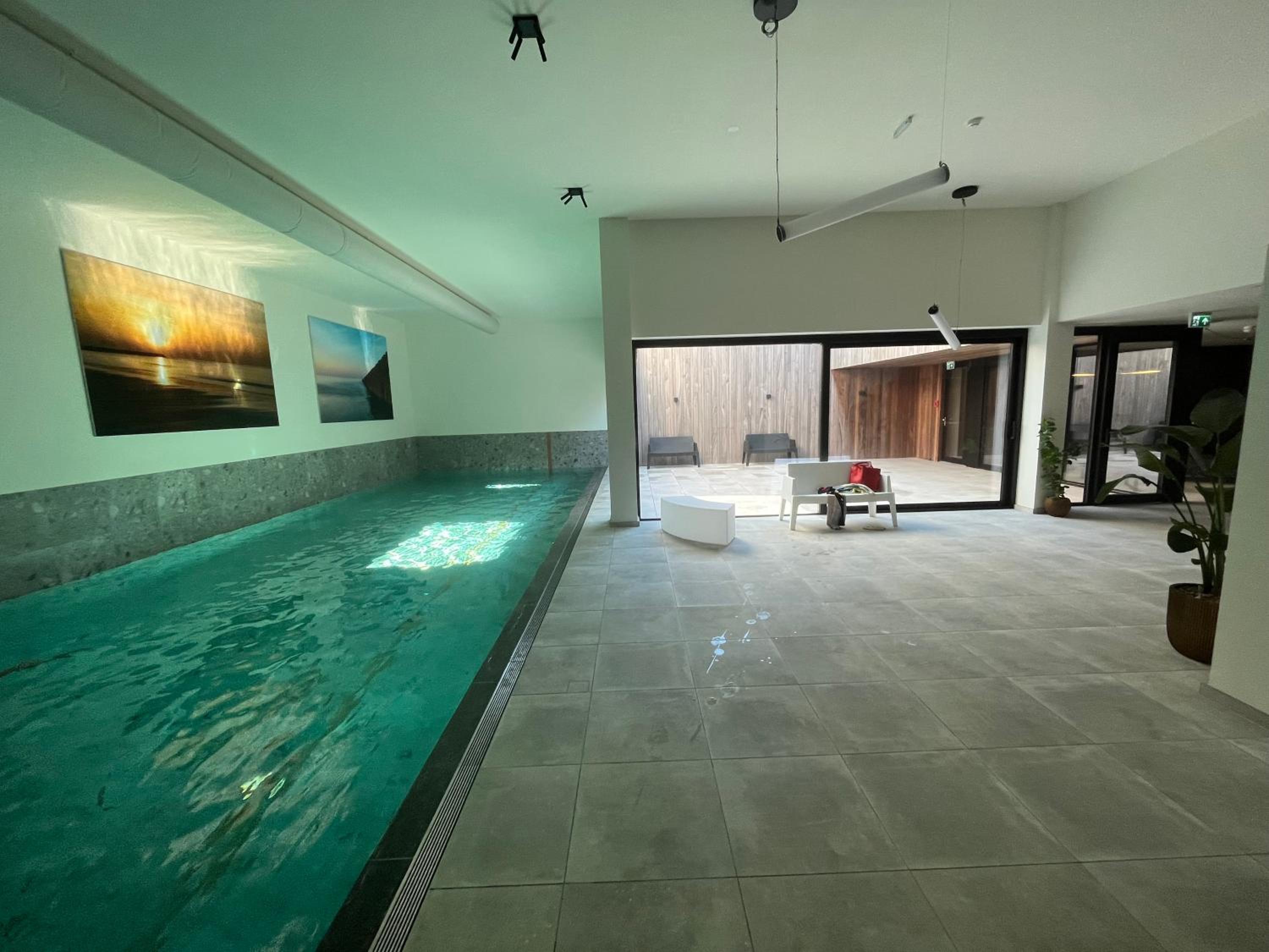 Design Apartment with 60m² terrace - heated inside pool and wellness facilities - very close to the beach view 3