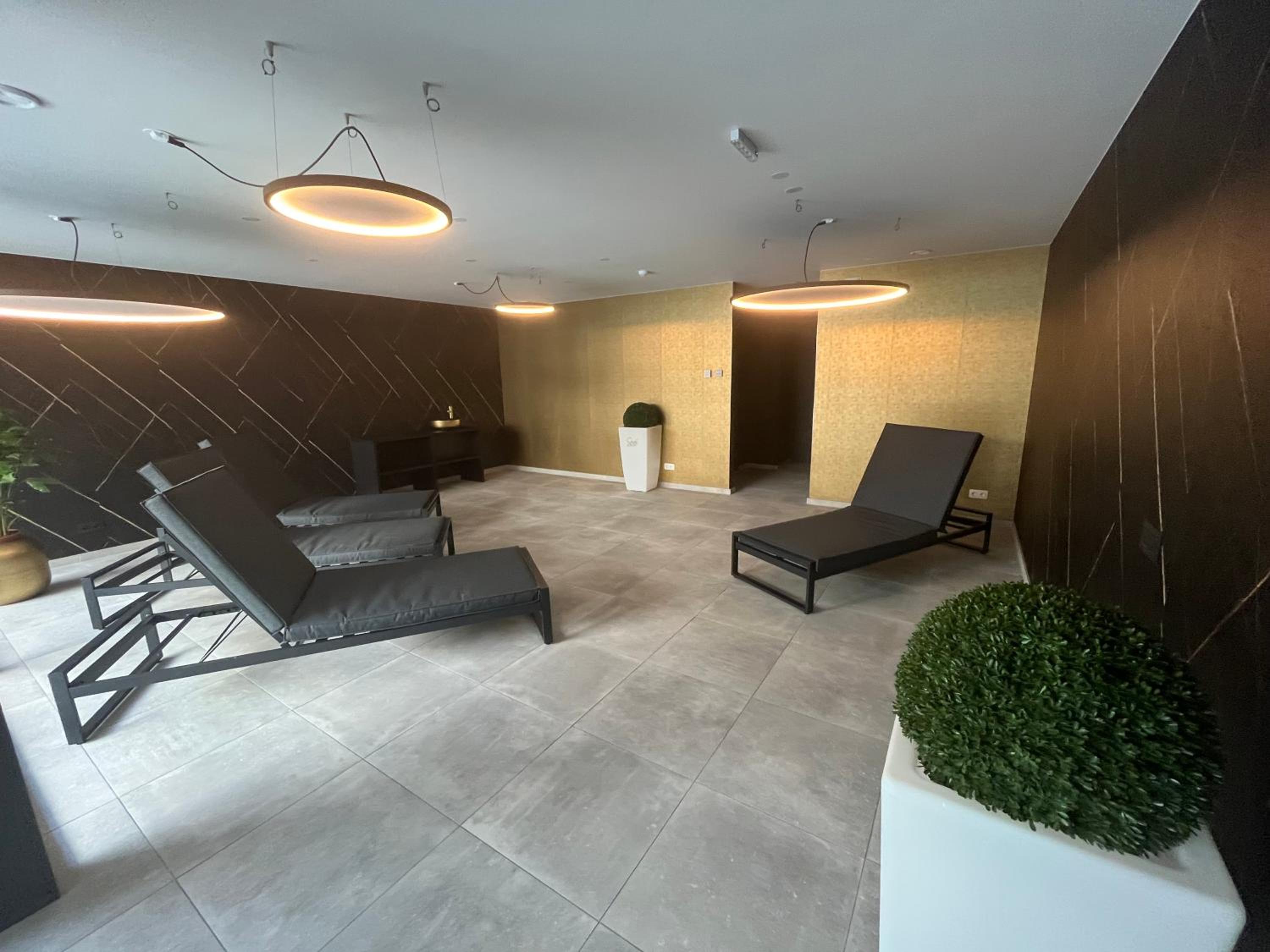 Design Apartment with 60m² terrace - heated inside pool and wellness facilities - very close to the beach view 5