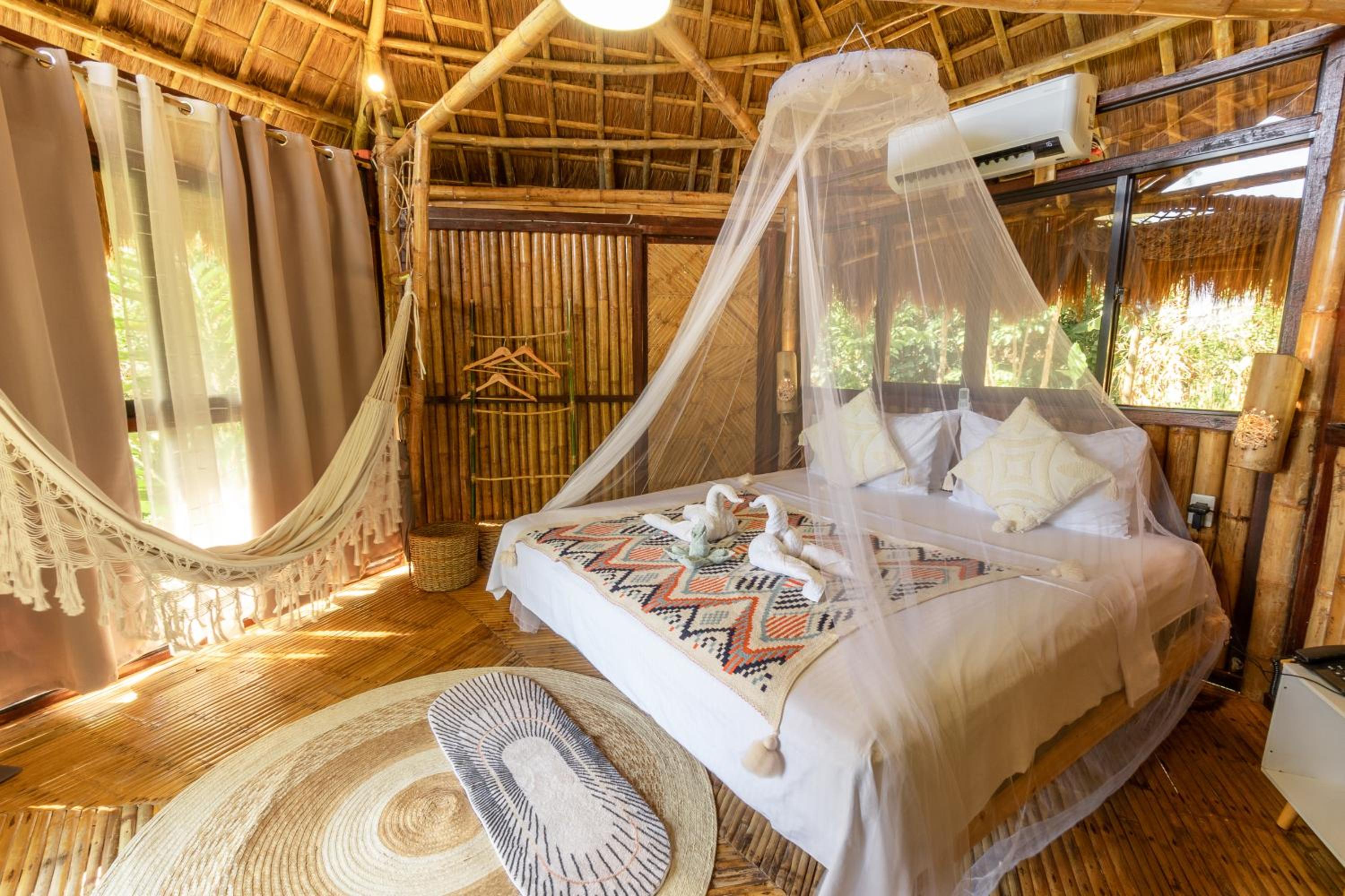 Inigtan Lio Bamboo Cottages view 2