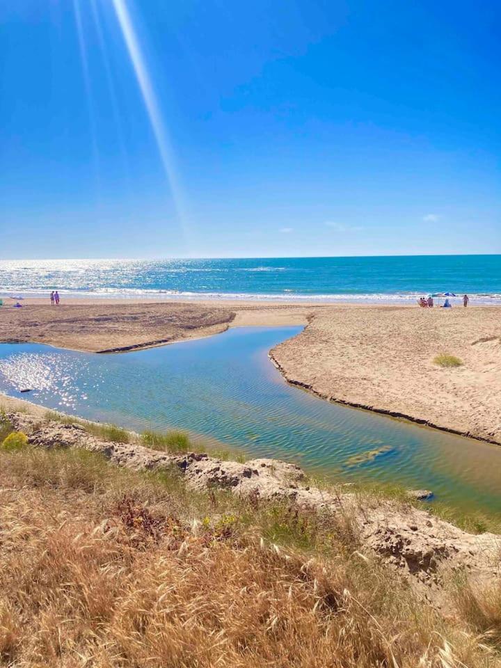 Apartamento primera línea de playa con piscina