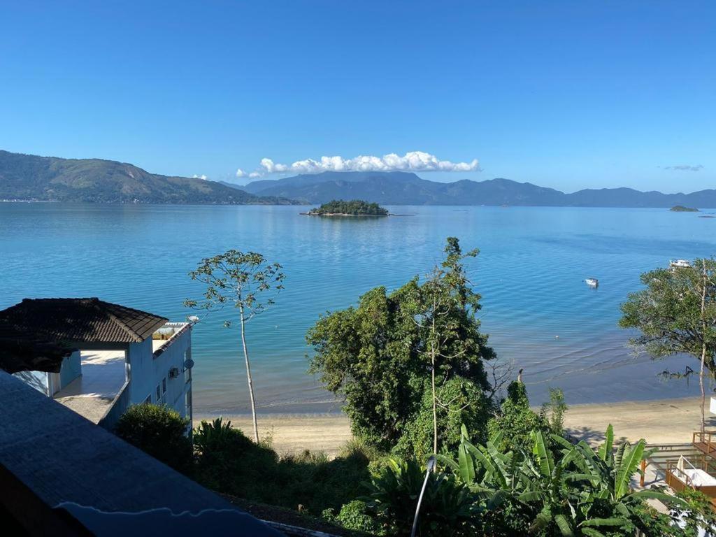 Casa Laranja em Condomínio Pé na Areia