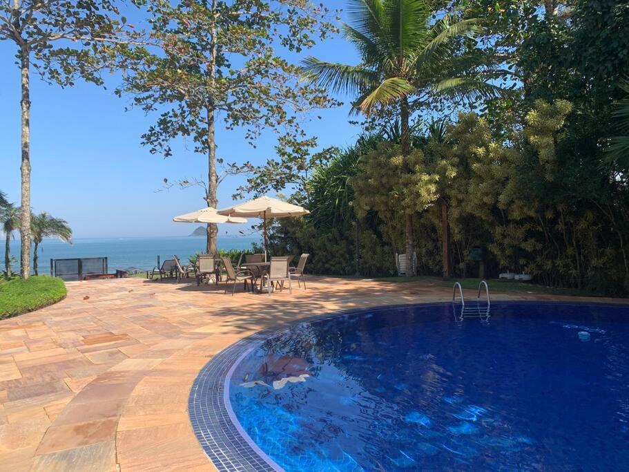 Casa Deliciosa em Condo c/ Piscina Frente ao Mar