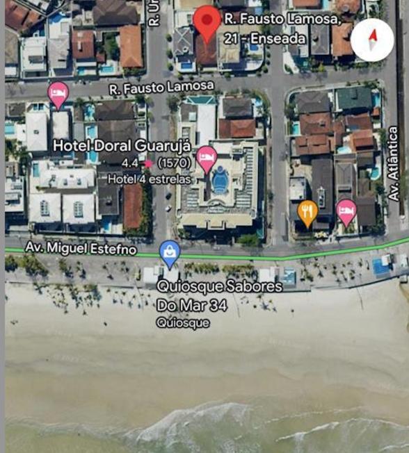 Enseada Casa com churrasqueira- 100 metros da praia com 4 dorm para até 14 pessoas
