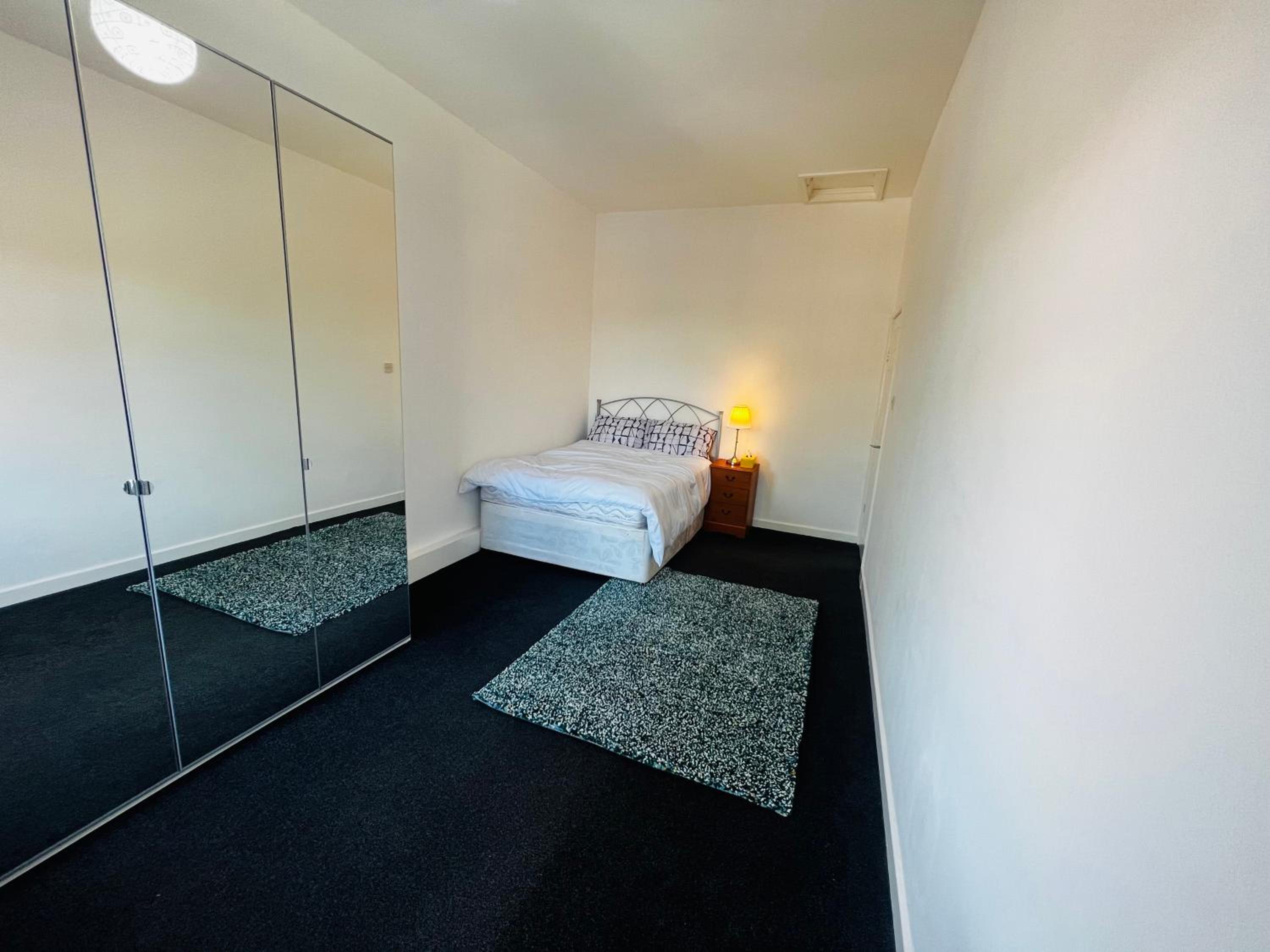 Liberty Inn Room with sharing toilet and kitchen view 2