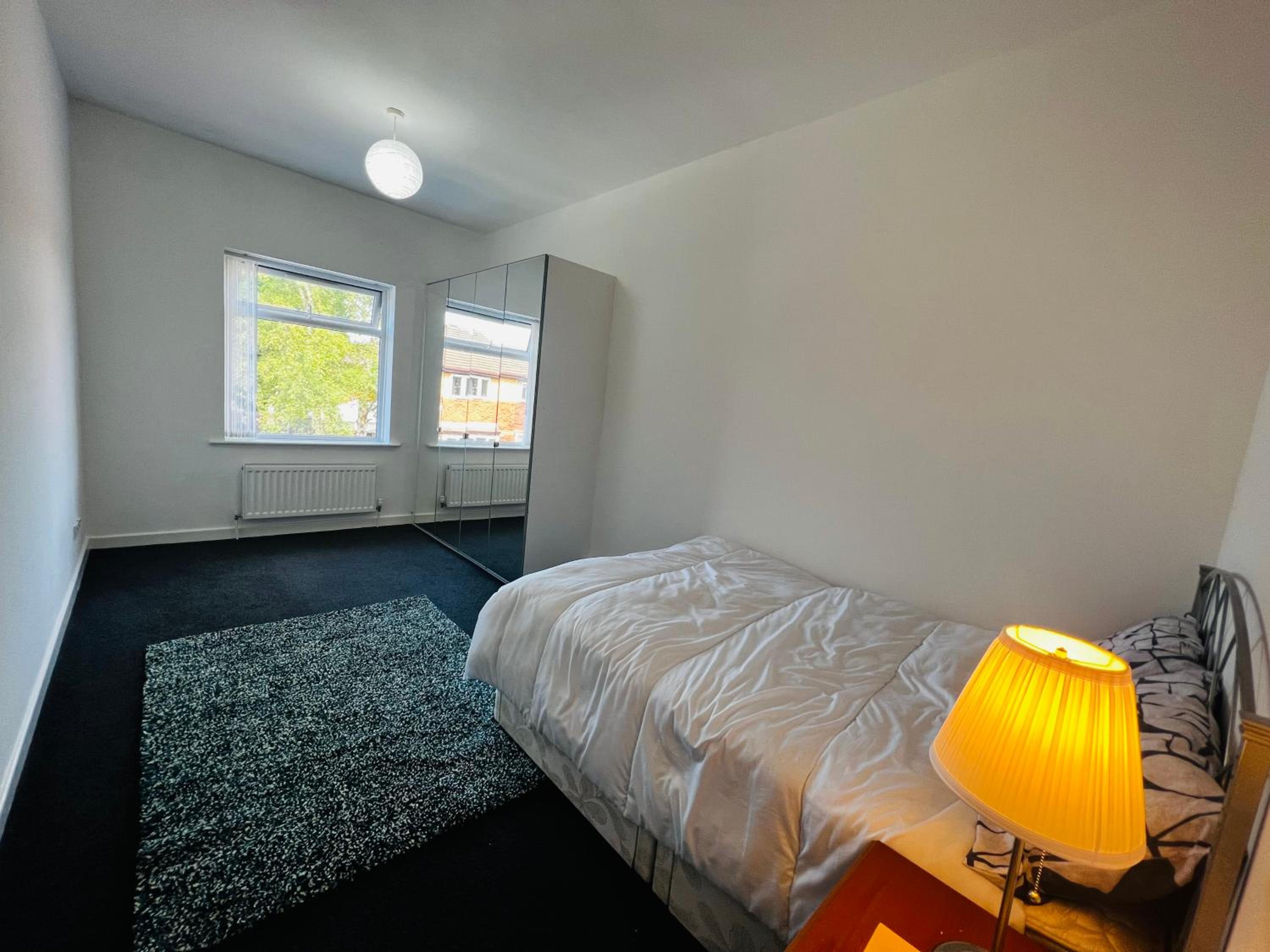 Liberty Inn Room with sharing toilet and kitchen view 5