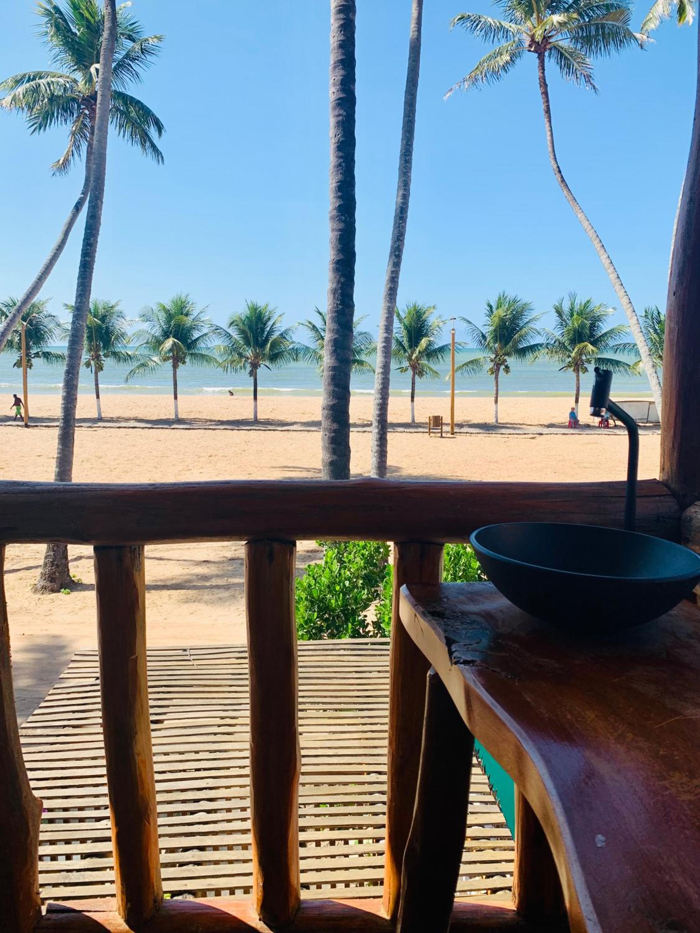 Suíte frente mar e pés na areia