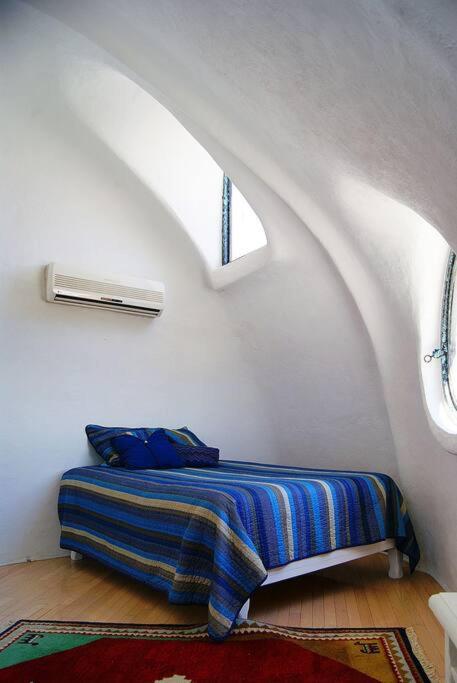 Casa estilo Gaudí - Alberca compartida espacio especial para familias!