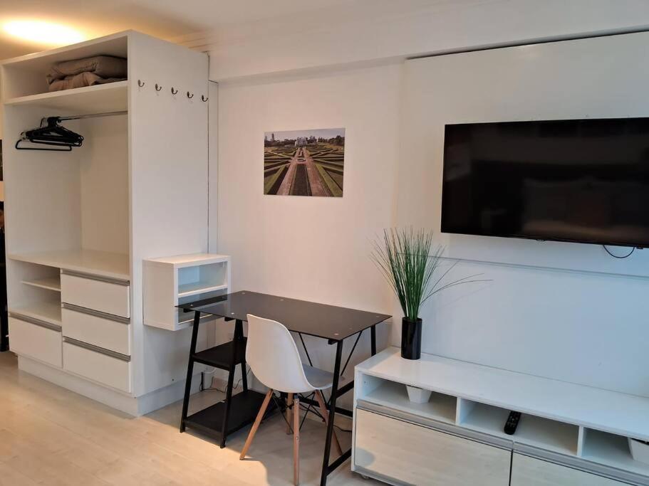 Lindo studio equipado em apartamento clube com academia e conforto no centro de Curitiba - MID Home