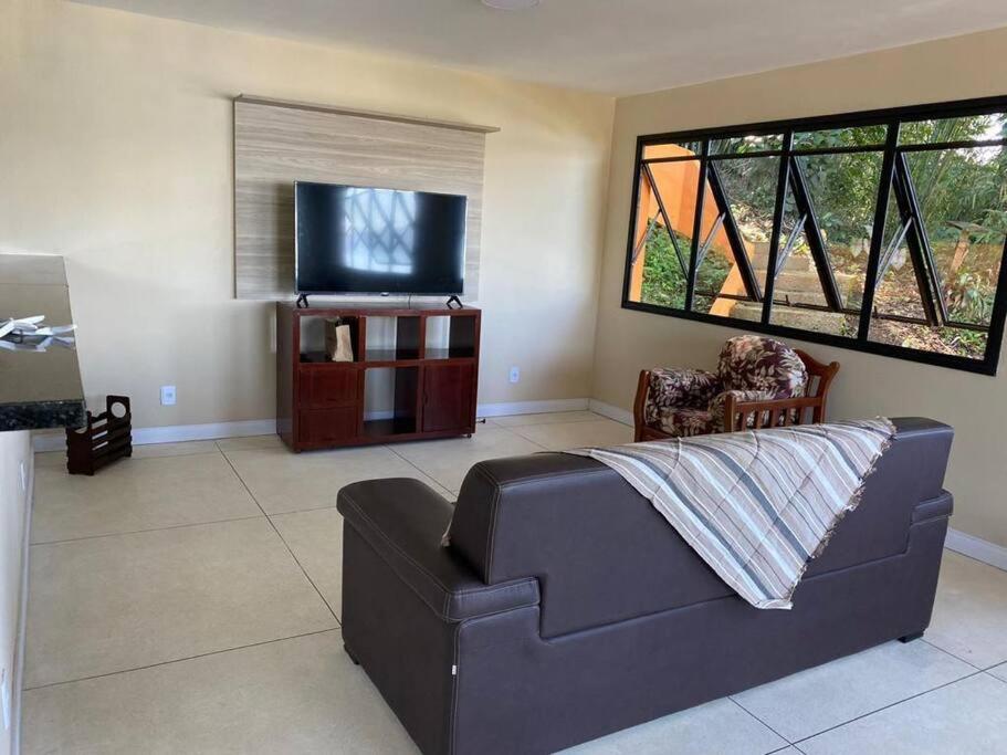 Casa Laranja em Condomínio Pé na Areia