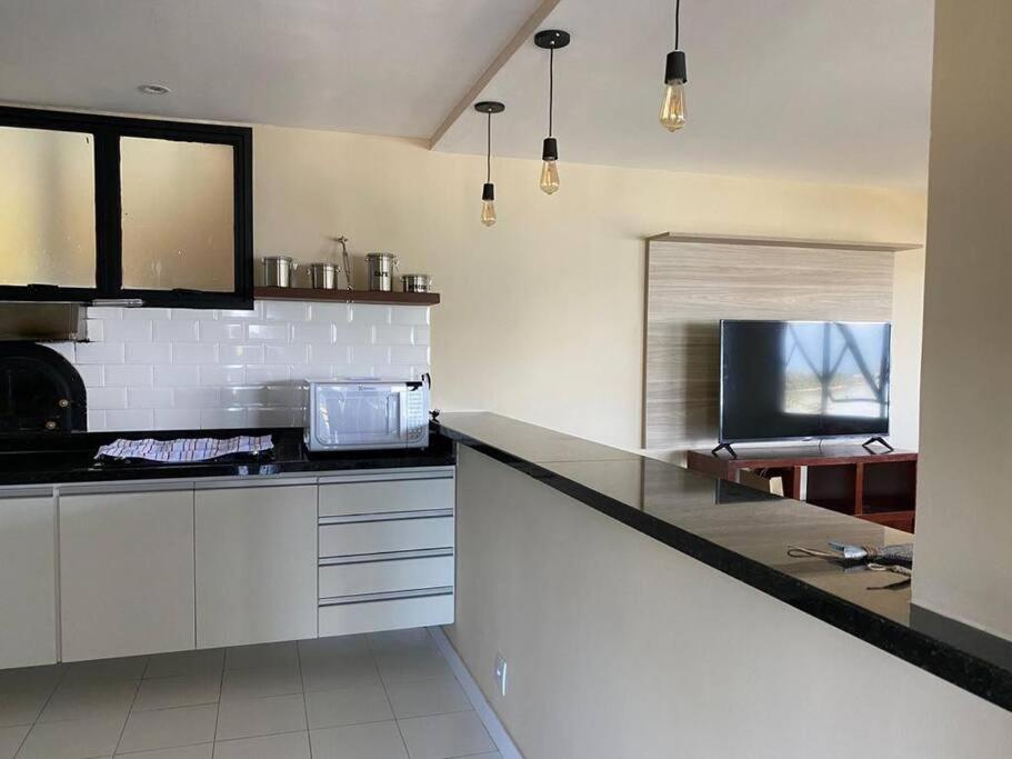 Casa Laranja em Condomínio Pé na Areia