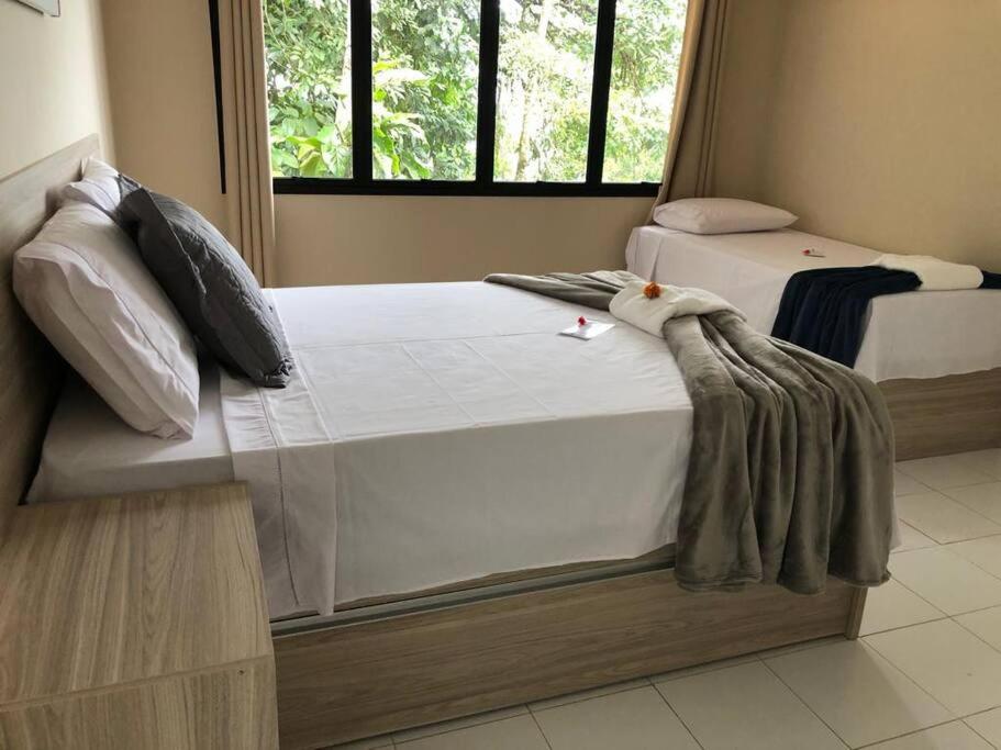 Casa Laranja em Condomínio Pé na Areia