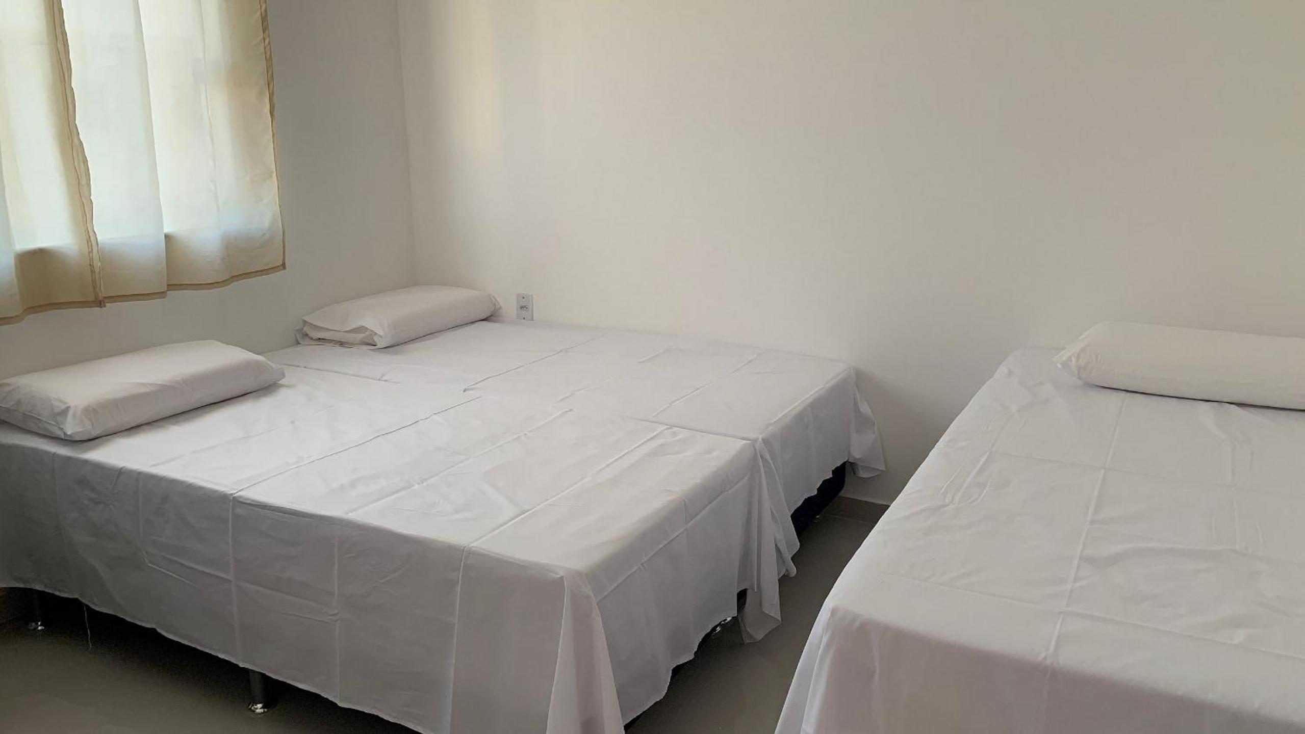 Quarto duplo na orla de Porto Bahia