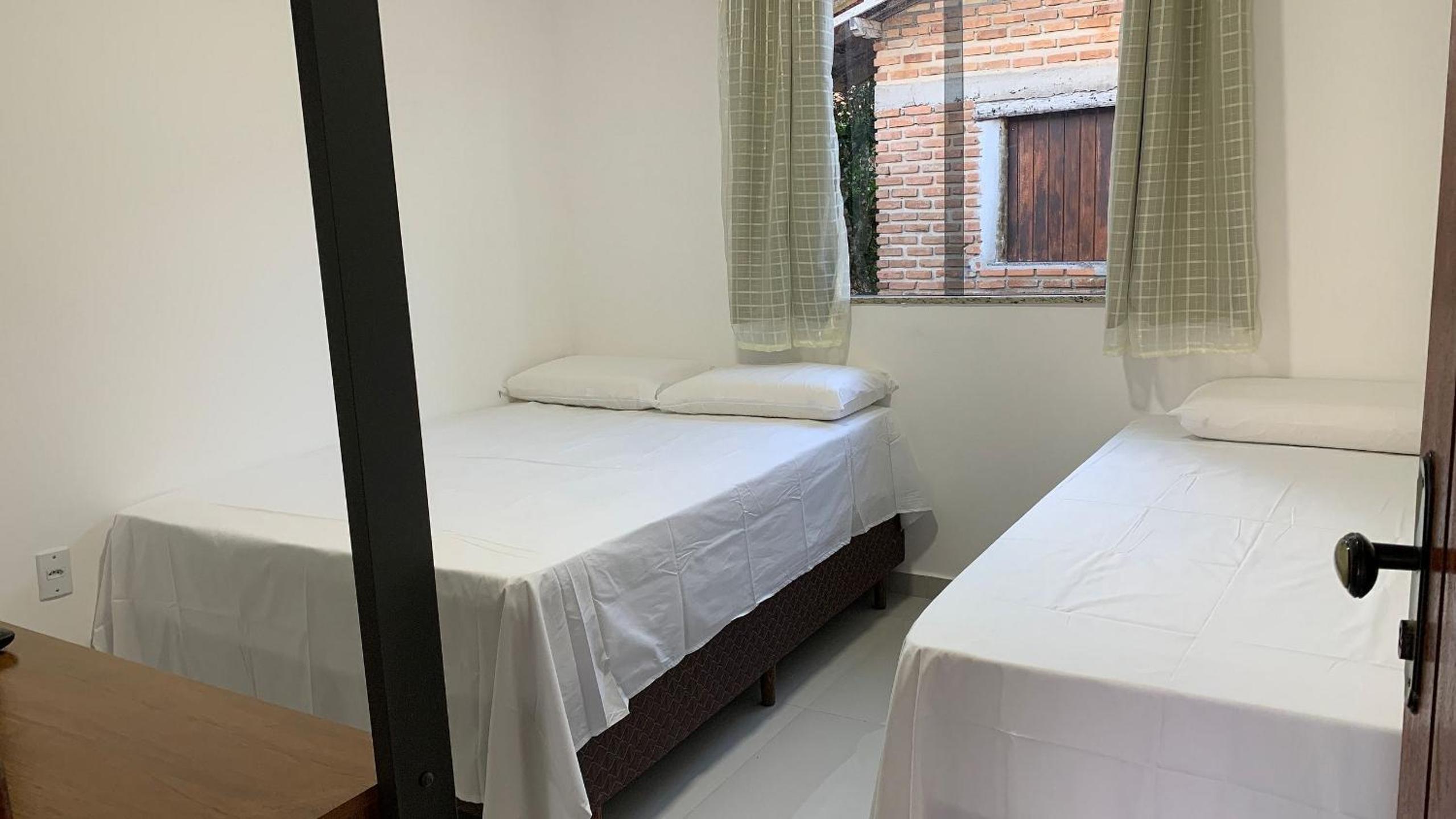 Quarto duplo na orla de Porto Bahia