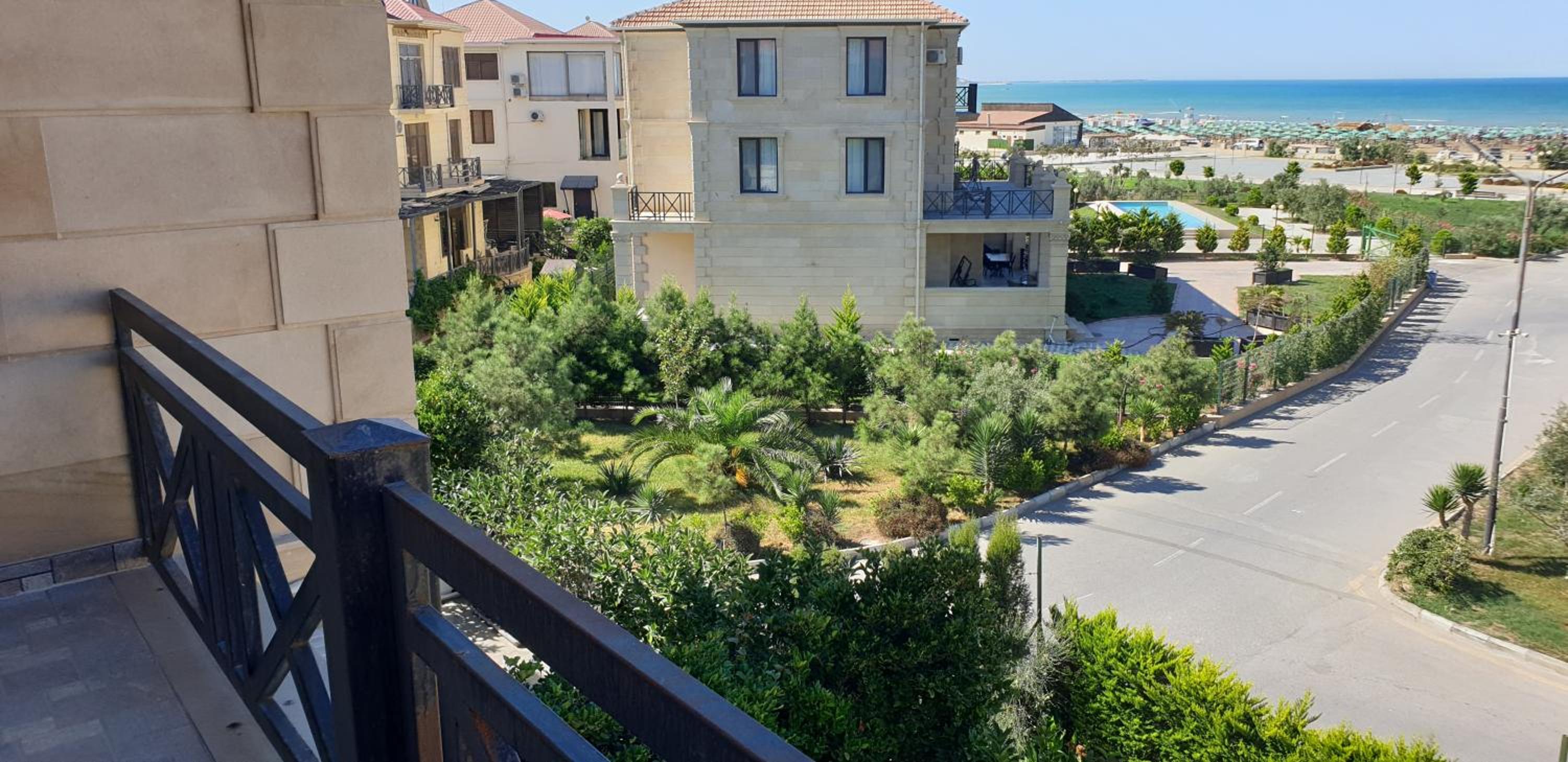 S Pollo Apartments by first beach line
