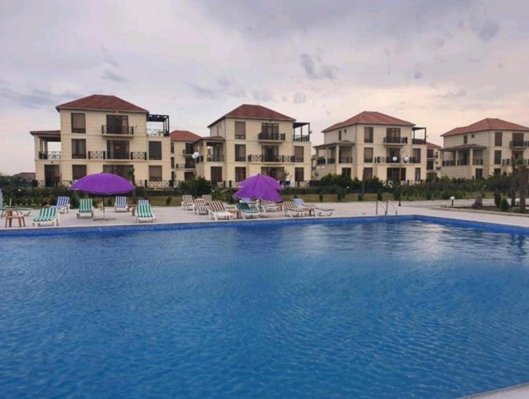 S Pollo Apartments by first beach line