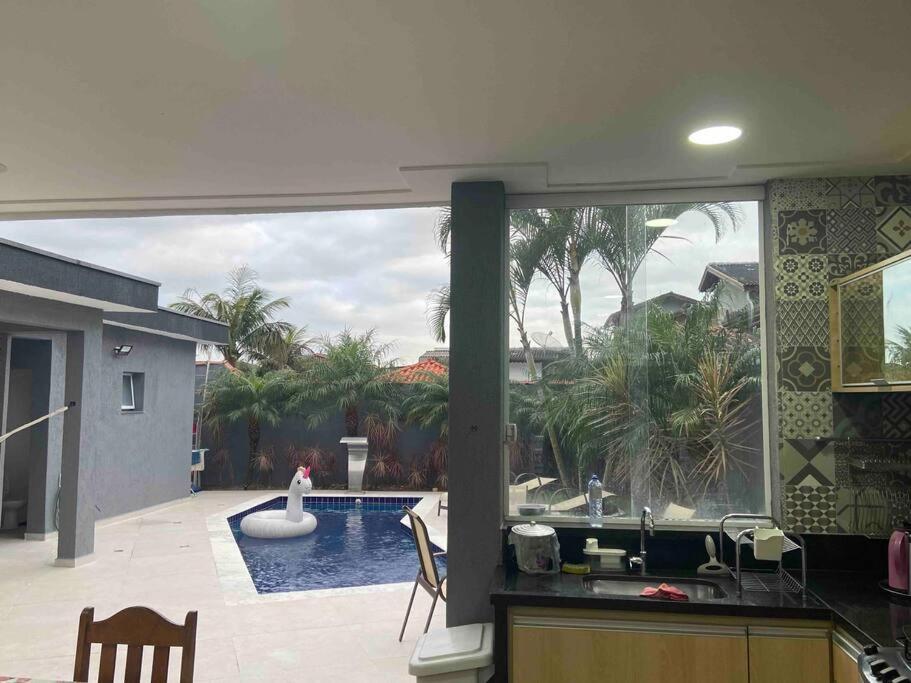 Sobrado moderno, piscina privativa, condomínio Morada da Praia!