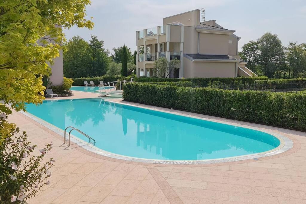 flat front lake with swimming pool, ground floor view 2