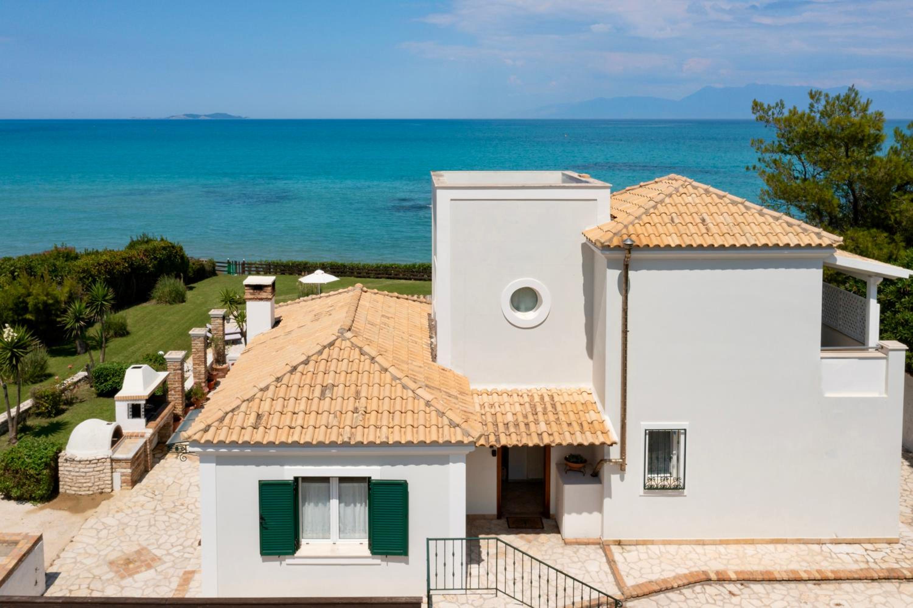 Beachfront Villa Victoras - With private beach photo 4