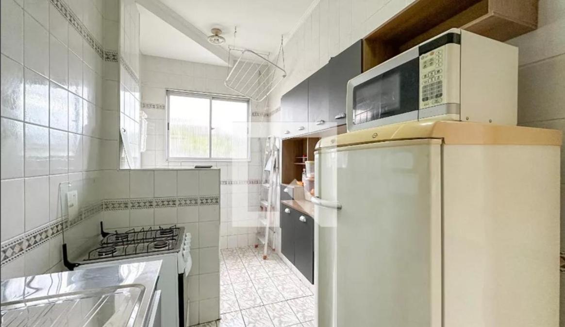 Apartamento com piscina 1 quarto de até 6 pessoas - Guarujá com Maquina Lavar Roupa