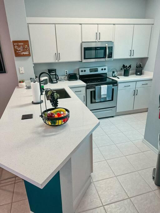 Roomy House Near Disney with Resort Pool and Patio BBQ view 5