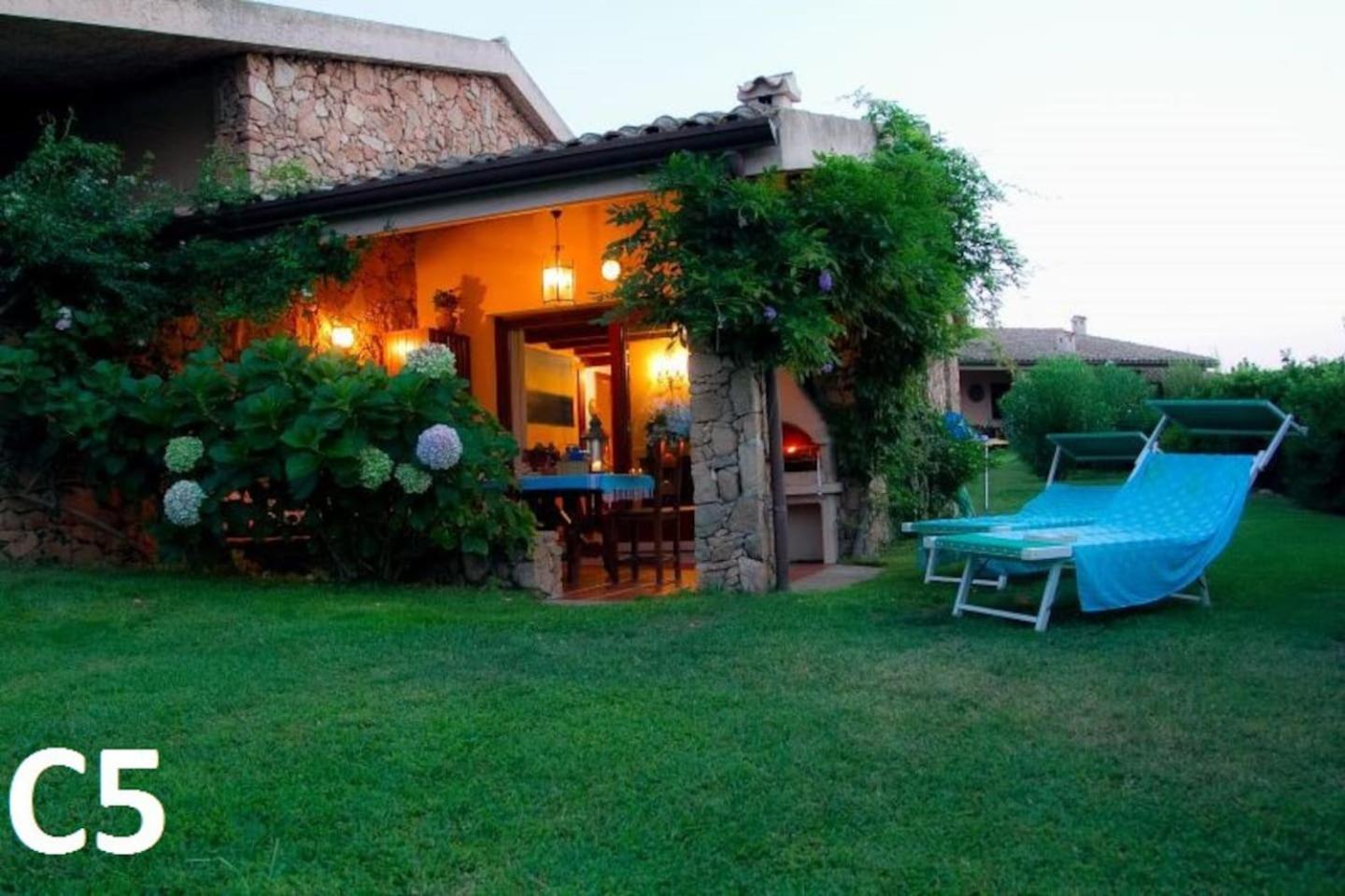 Private villa and boat mooring, Cala Paradiso Village in Coda Cavallo view 2