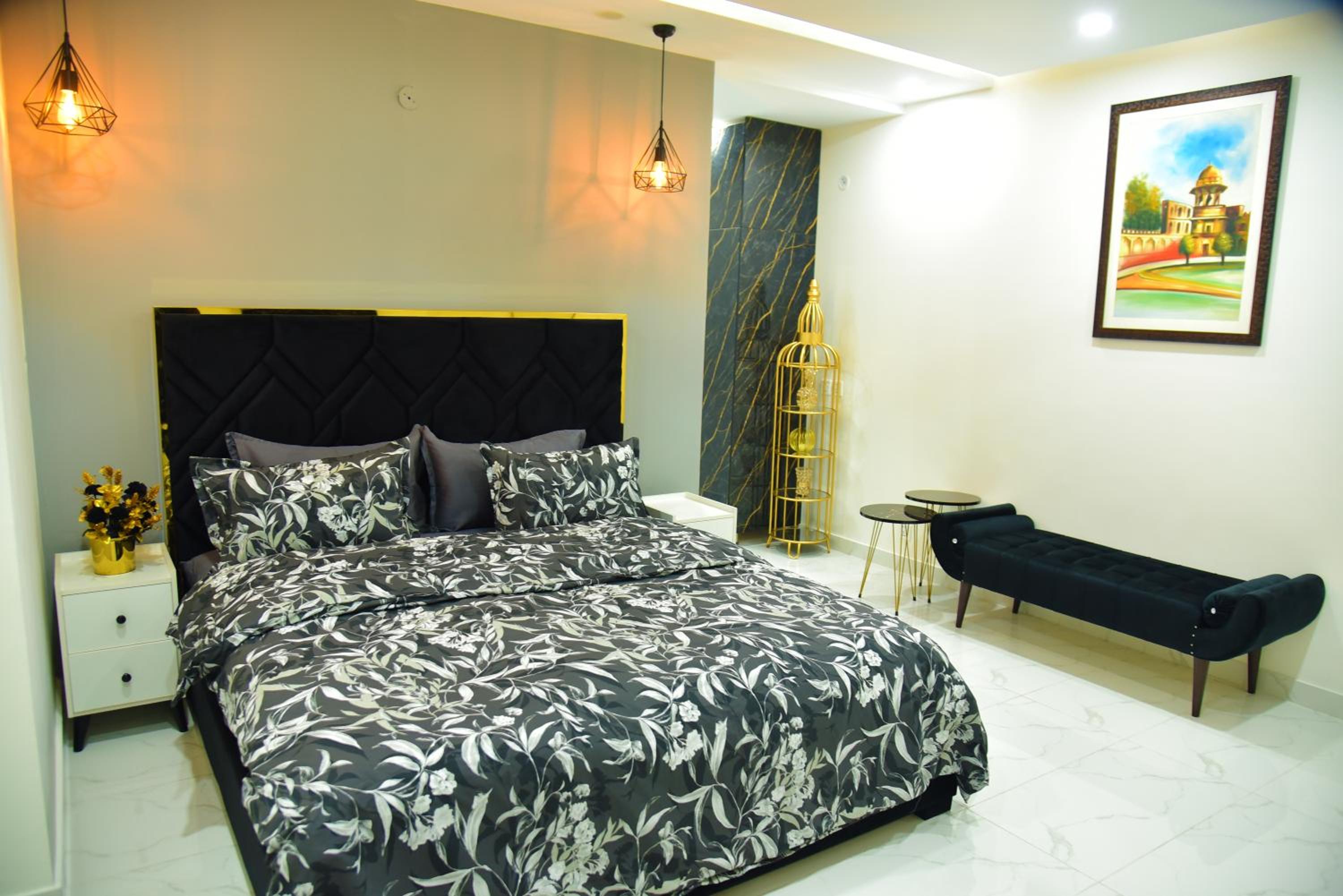 Chic Noir 1 Bedroom Apartment Gulberg view 5