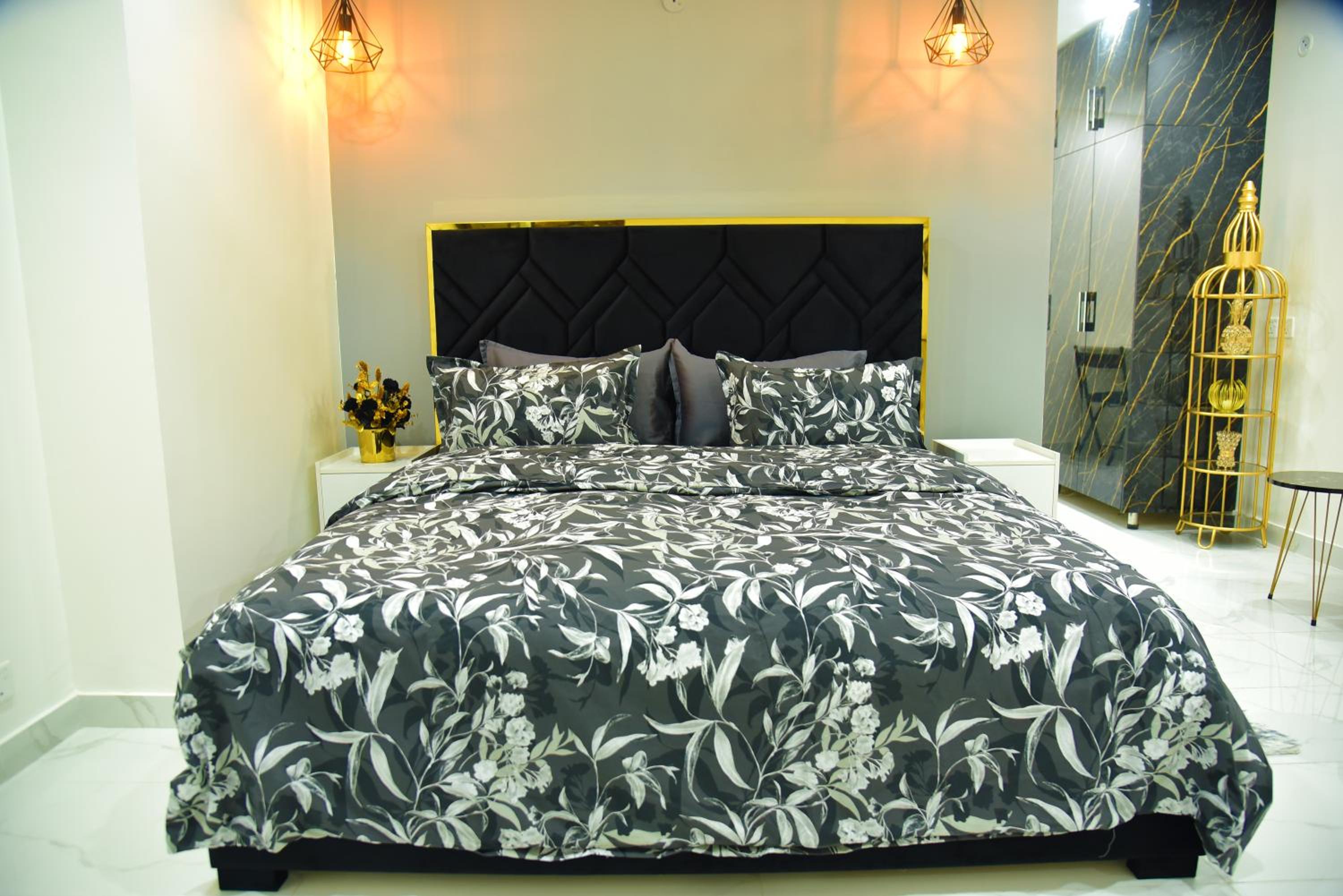 Chic Noir 1 Bedroom Apartment Gulberg view 3