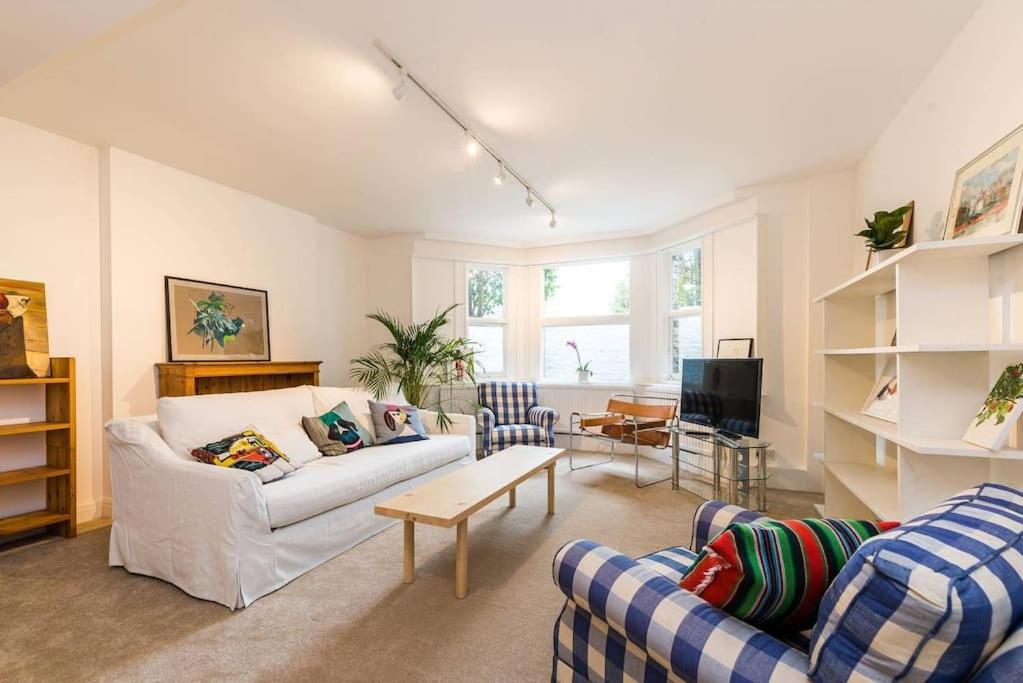 Elegant 2-Bedroom Getaway w Terrace & Garden Views