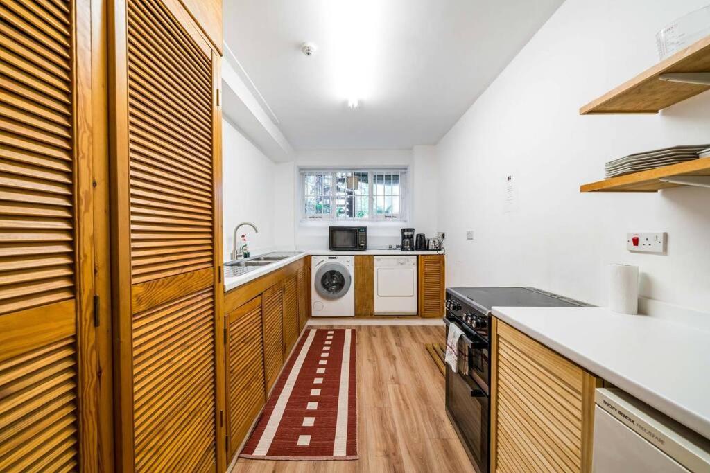 Elegant 2-Bedroom Getaway w Terrace & Garden Views